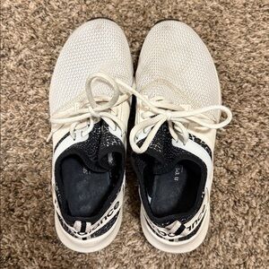 Cream and Black new balance sneakers. Size 7.5